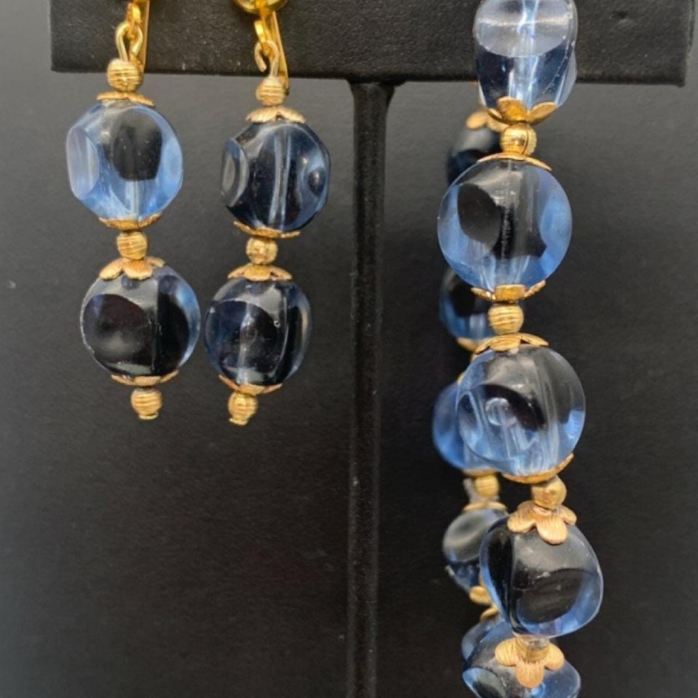 Clip on earrings & bracelet set 2 tone blue lucite beads and gold tone accents